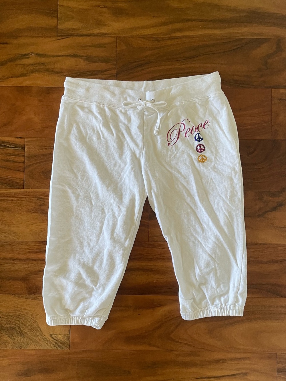 Feathers White Capri Sweatpants with Bedazzled Peace Sign Graphics